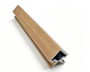 Co-extrusion visible corner trim for wall cladding